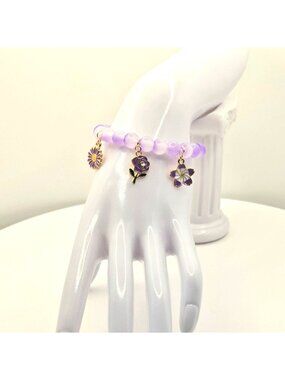 Lavender Beaded Bracelet With Floral Charms And Gold Accents - Elegant Handmade